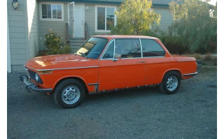 Illustration for article titled How To Stay Classy In A BMW 2002 Without Breaking The Bank